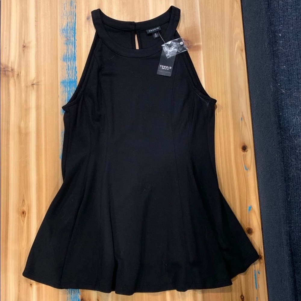 Torrid black peplum sleeveless shirt